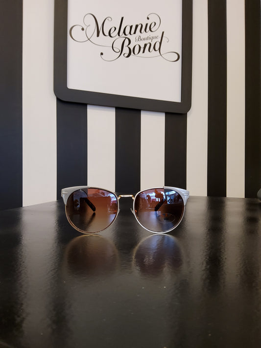 Gold rim tortoiseshell sunglasses