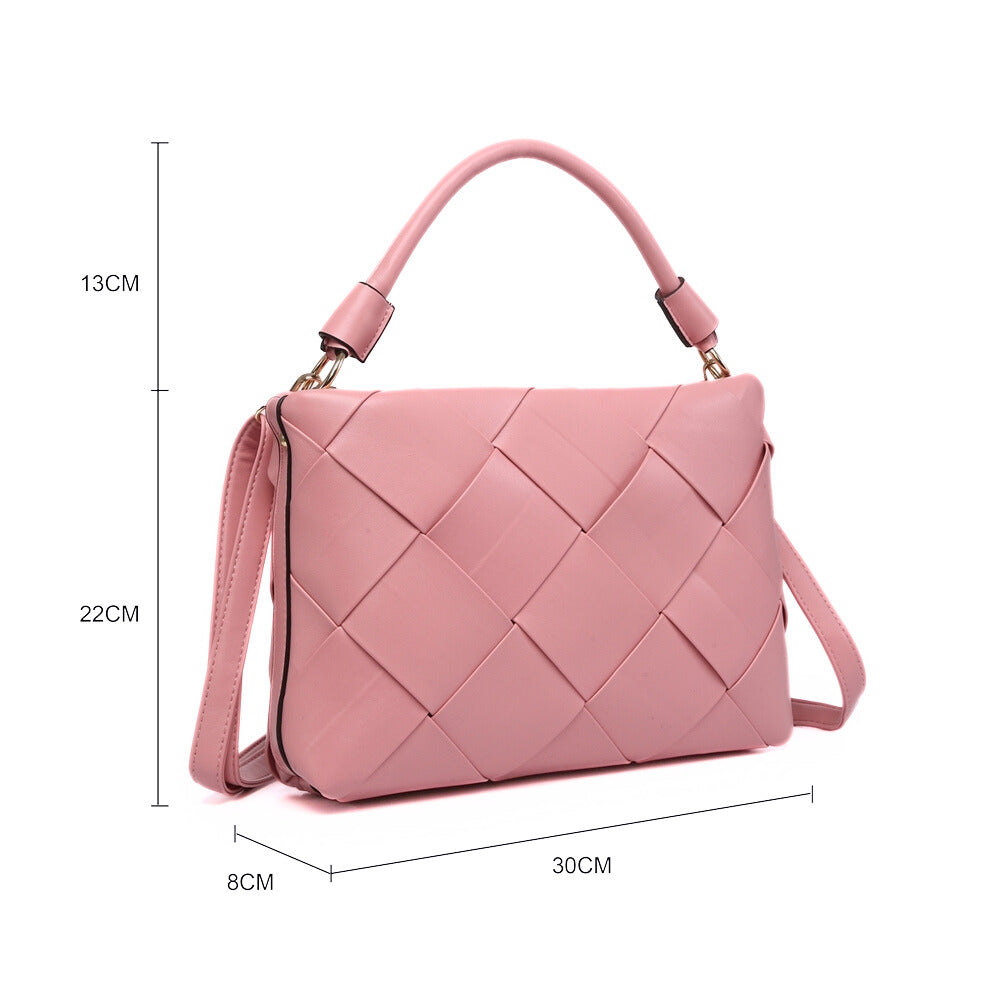 Pink woven handbag