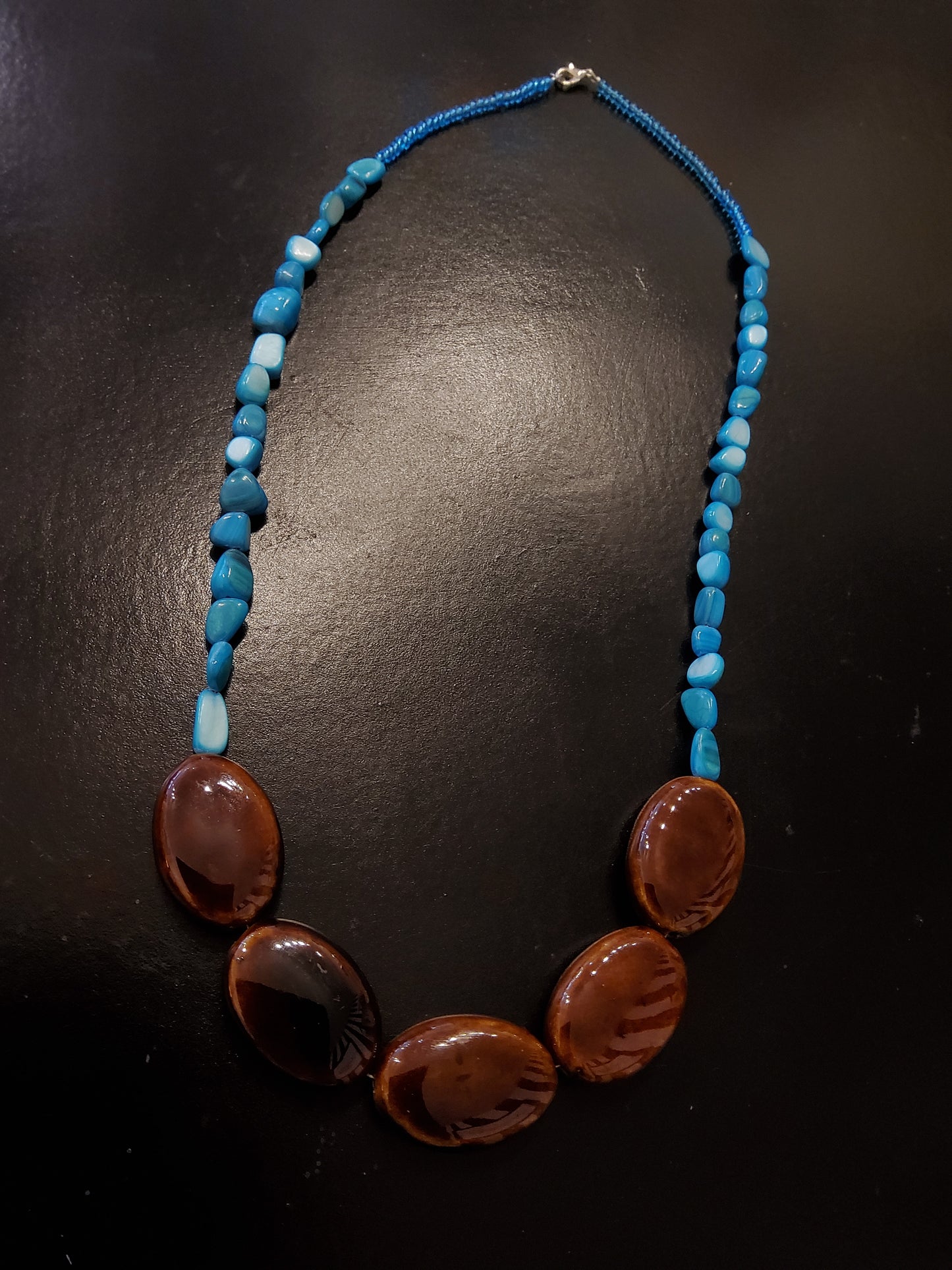 Turquoise and brown beaded necklace