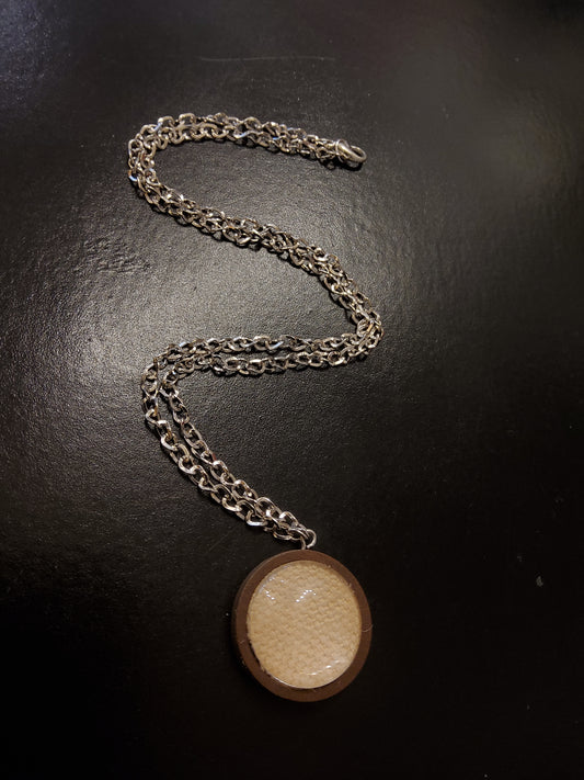 Cream Linen Necklace with silver chain and wooden base