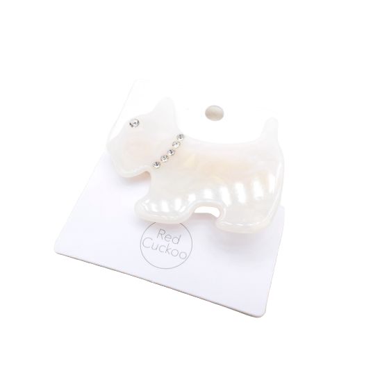 White dog hair clip a diamante collar.