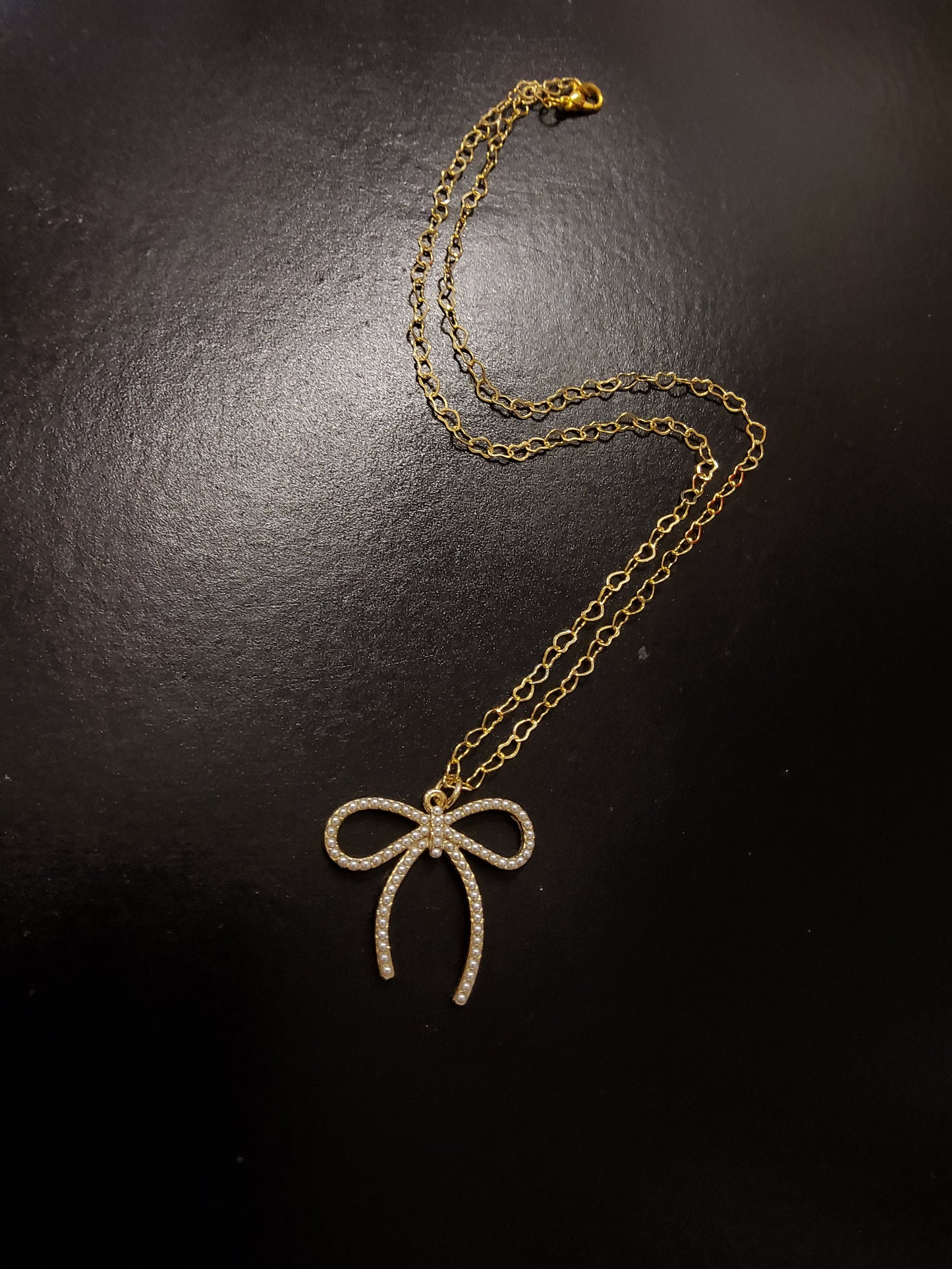 Gold Diamanté Bow Necklace with Heart Chain