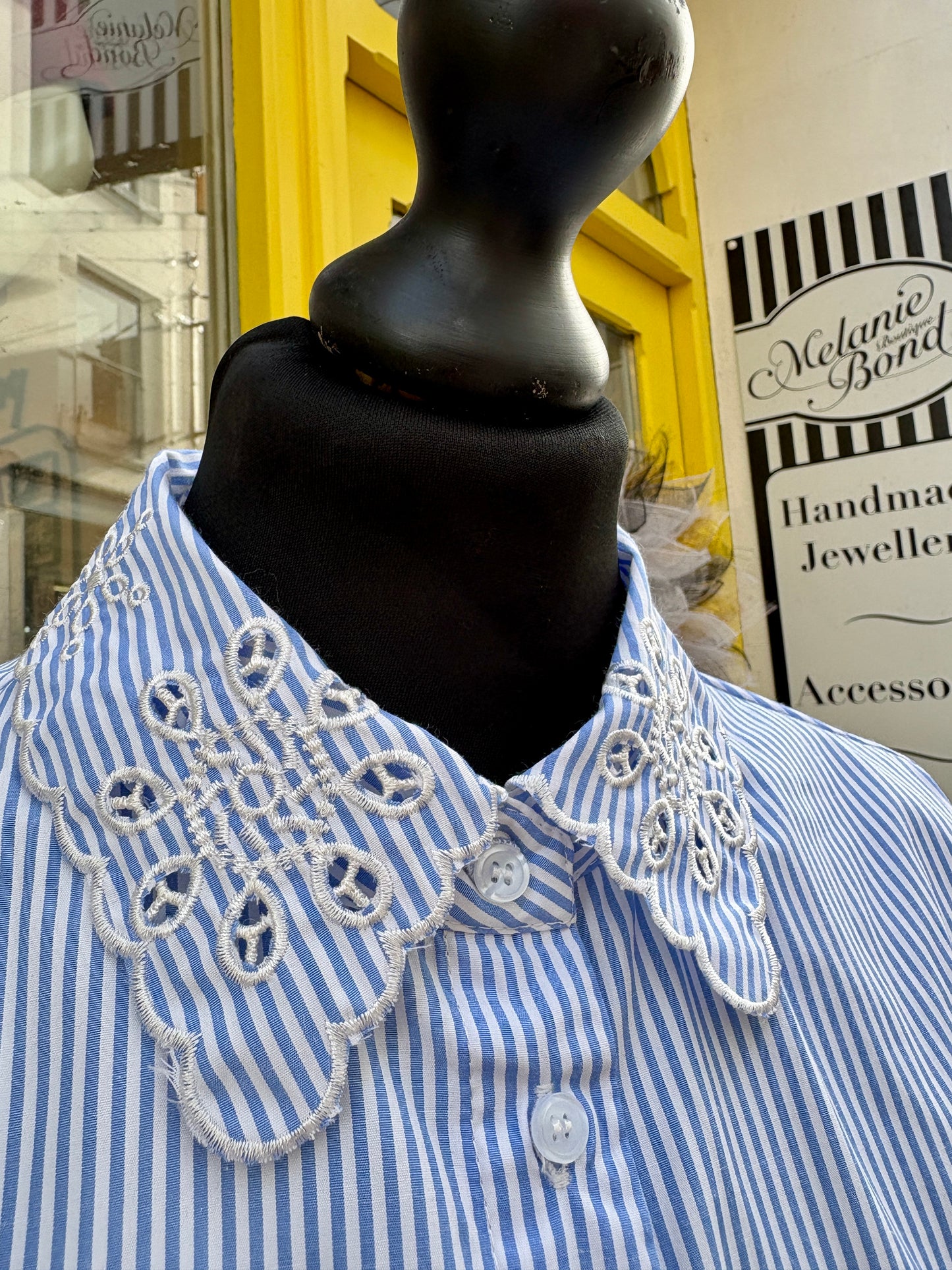 Blue and white striped shirt with lace detail