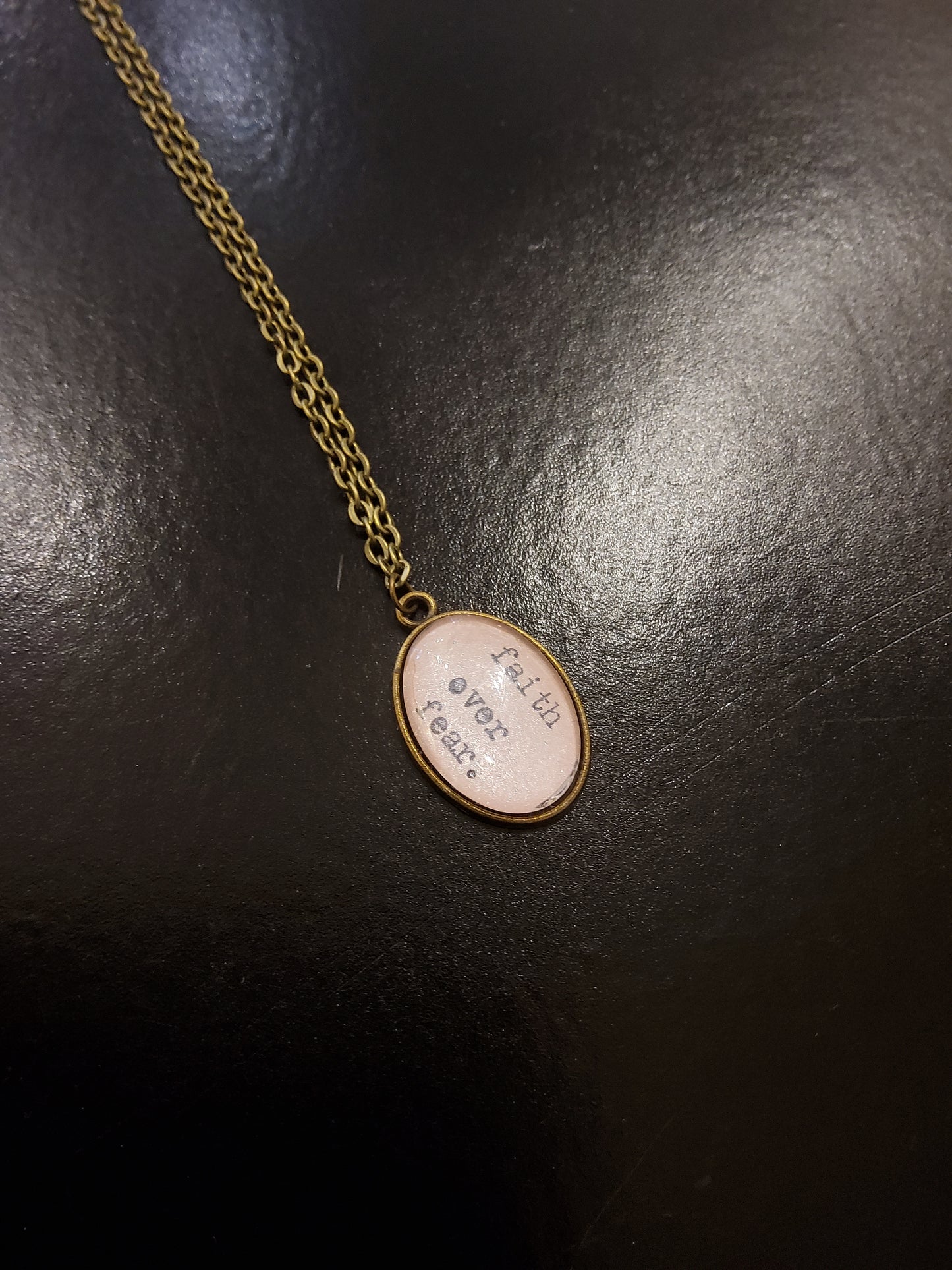 'Faith Over Fear' Pink Oval Pendant Necklace