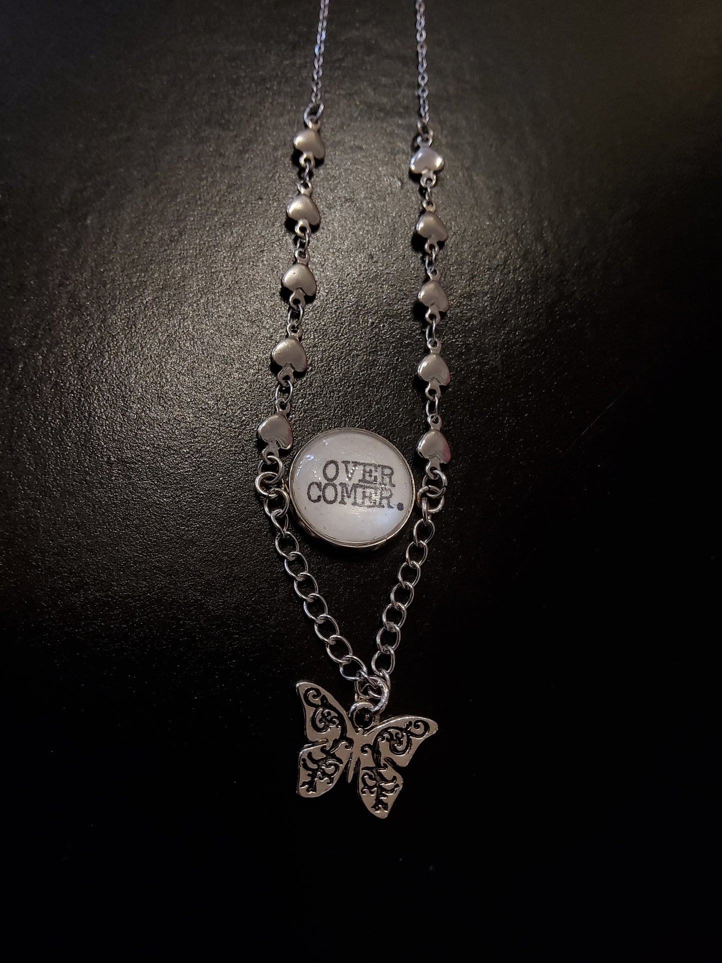 ‘Overcomer’ Necklace with Heart Chain and Butterfly Charm