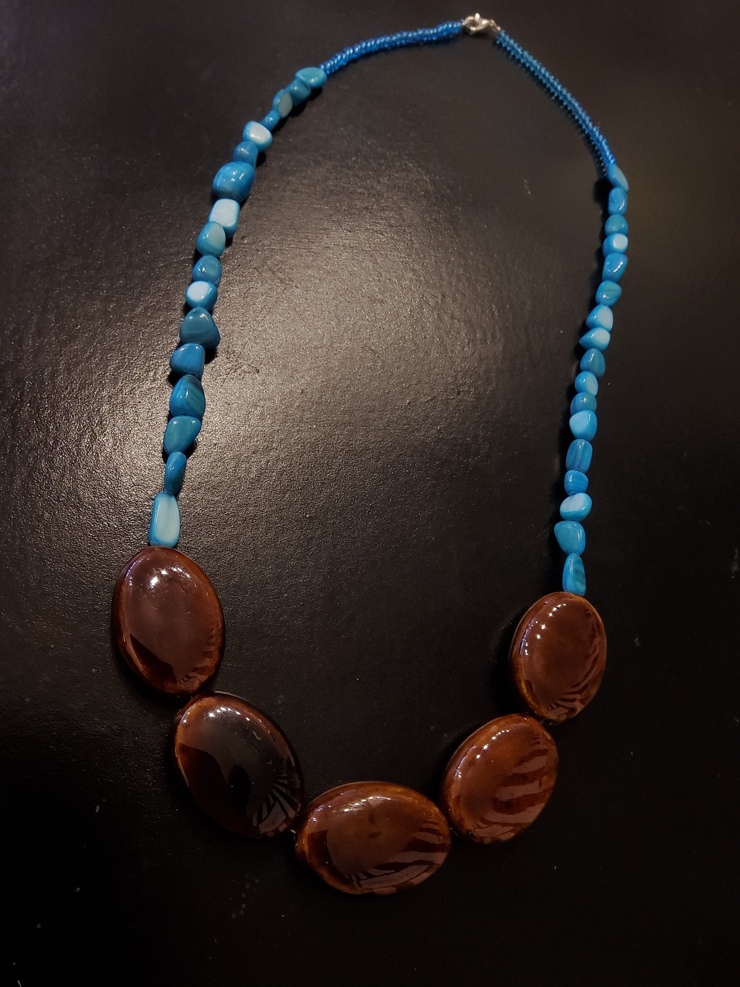 Turquoise and brown beaded necklace
