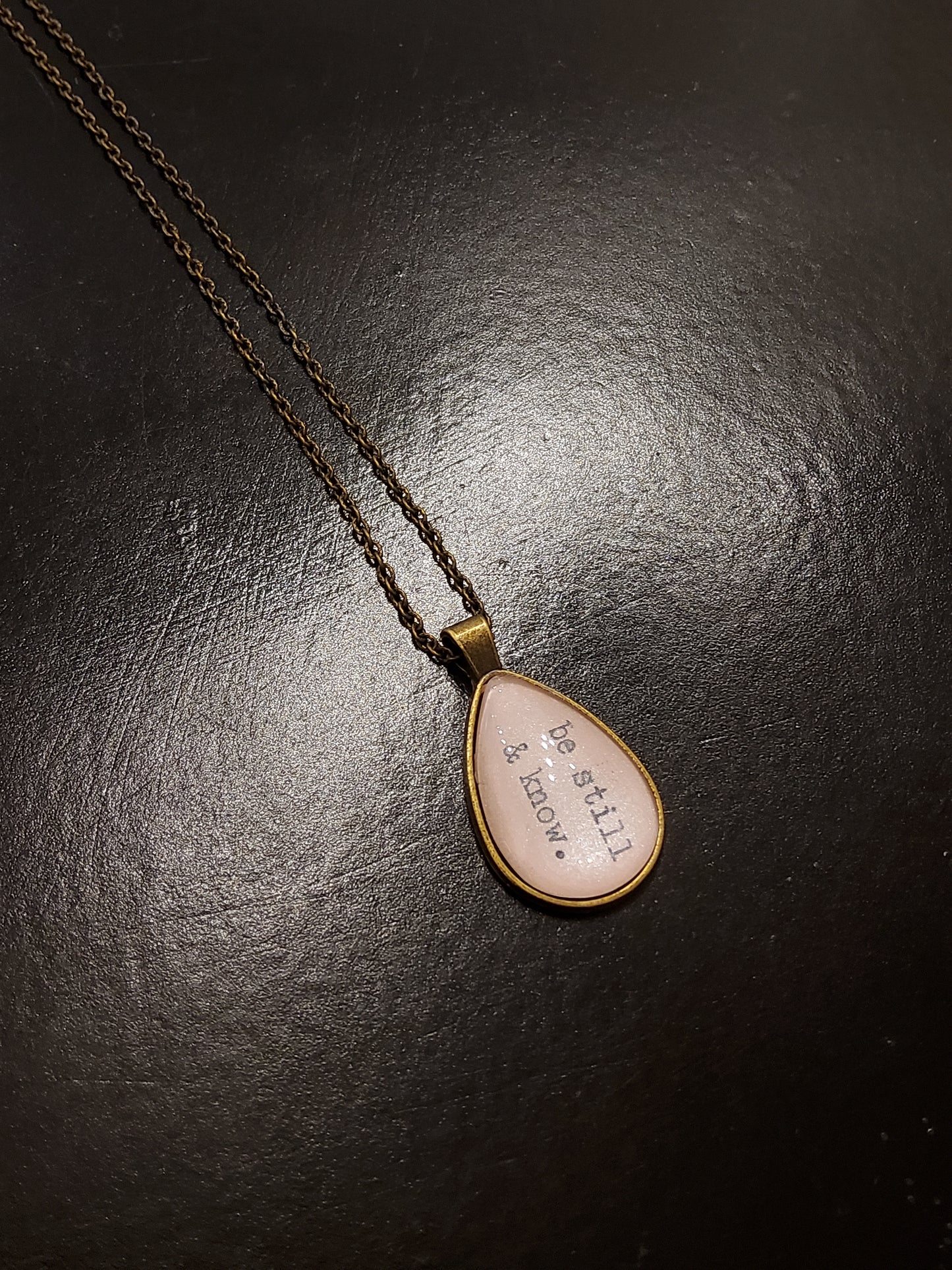 'be still & know.' Pink Teardrop Pendant Necklace