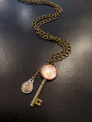 'Be Still and Know' Orange Key Necklace