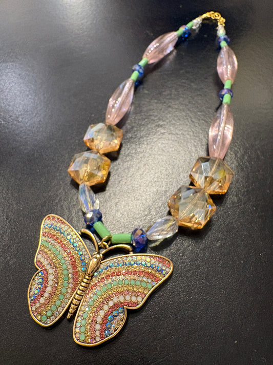 Multi-coloured crystal necklace with sparkly butterfly pendant